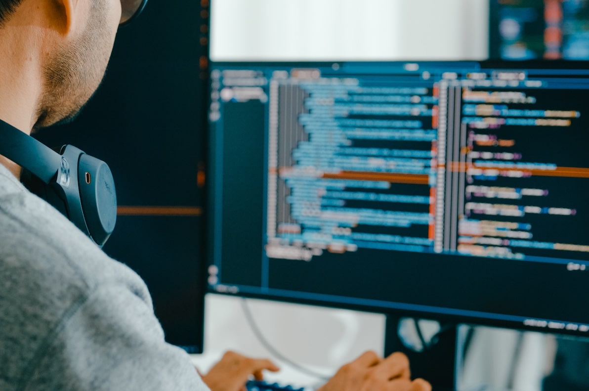 A web developer works on code for a bespoke website